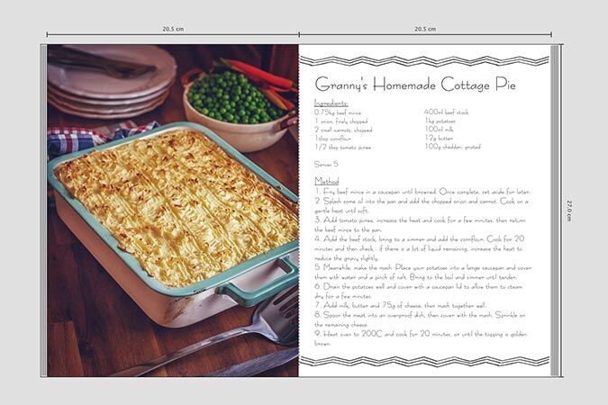 A homemade cottage pie in a baking dish on a table, surrounded by ingredients.