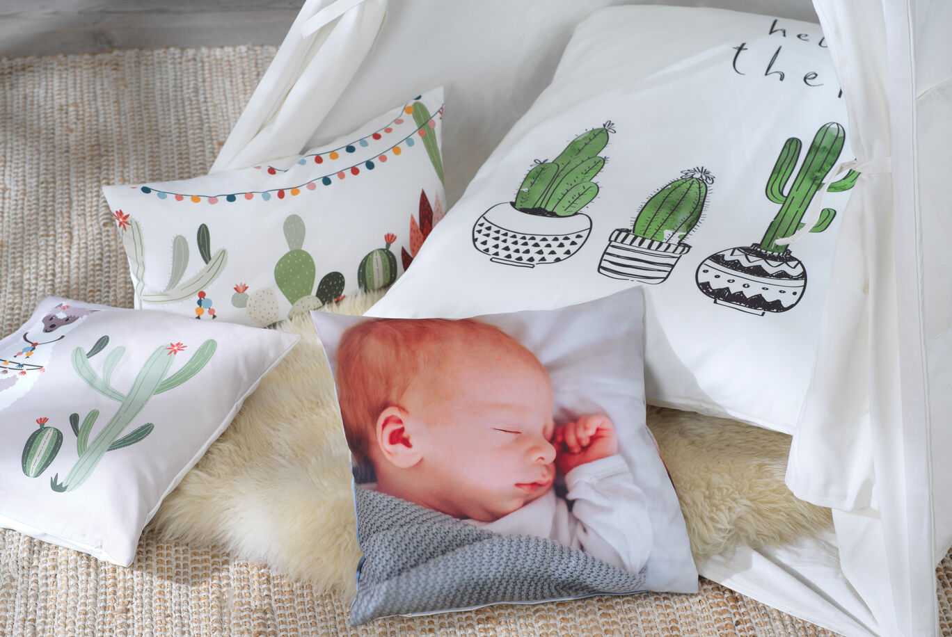 Colorful cushions with plant patterns on a carpet.