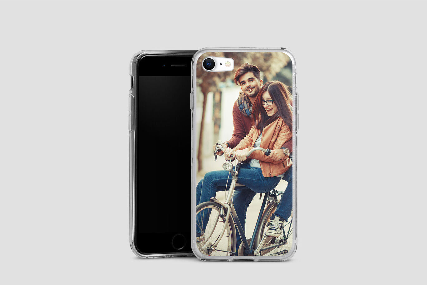 A couple enjoys a bike ride together on a sunny day