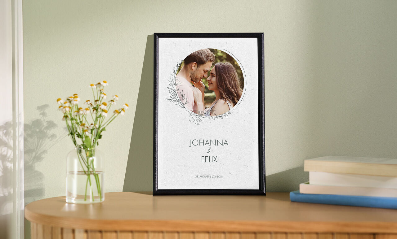A beautiful framed picture with names in a creative design.