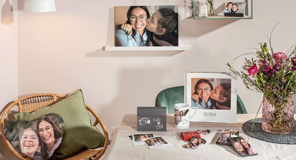 Lovely personal memories in various pictures on a table and a shelf.