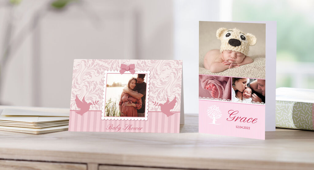 A beautiful birth card with a photo of a baby and a bear-shaped toy. The card shows lovely design elements.